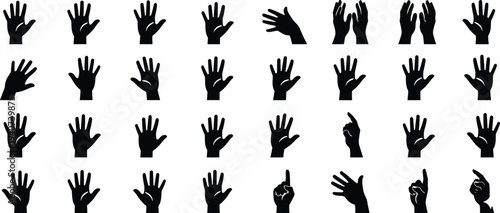Large collection of black silhouettes showing diverse human hands in various gestures including waving pointing clapping and open palms isolated on white background for design
