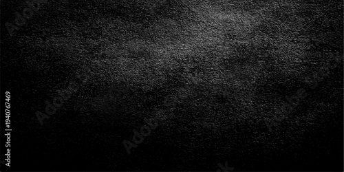 Dark grunge black and white background with a textured stone wall pattern and scratched old concrete surface for a vintage paper backdrop