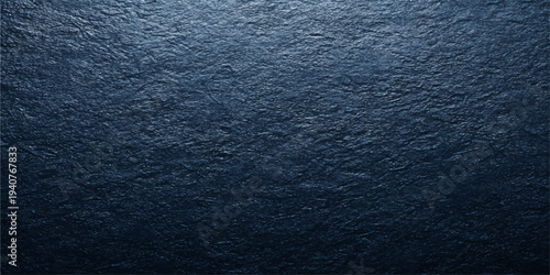 Blue denim fabric texture ripples like the deep color of a tropical ocean surface with a natural wave pattern reminiscent of a summer sea horizon