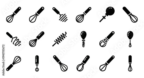 Collection of various kitchen utensils and mixers arranged neatly on a clean surface for baking and cooking purposes from a top view