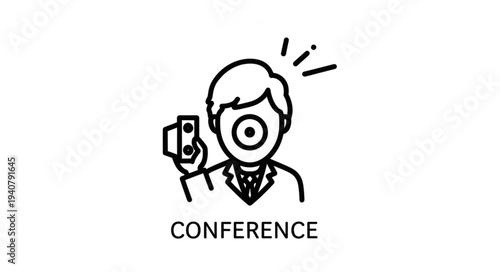 Man holding a badge at a conference event.