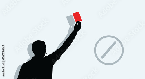 Referee Holding Red Card in Hand.