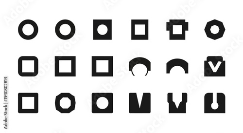 Collection of various black geometric shapes including circles, squares, and abstract icons displayed on a plain white background from a straightforward viewpoint