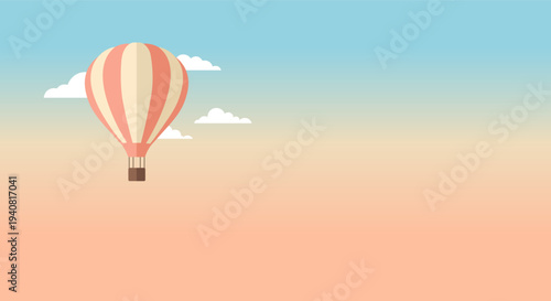 hot air balloon floats serenely in a gradient sky with soft clouds