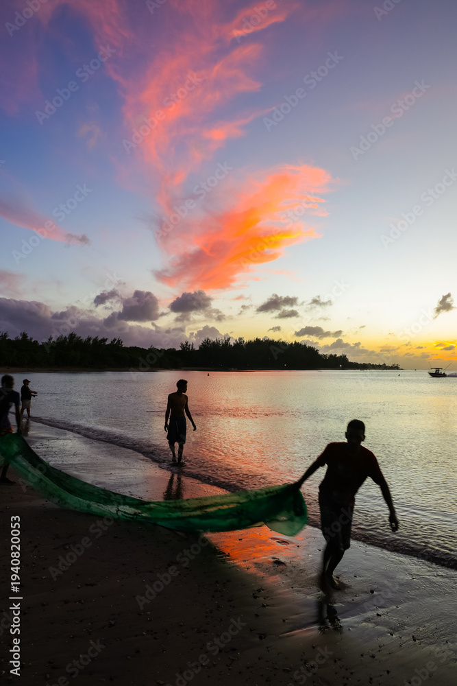 Fototapeta premium Fishermen on the coast of Mauritius Island, Tamarind Beach, Africa
