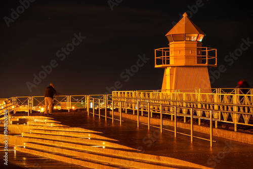 Lighthouse by the coast in city of reykjavik