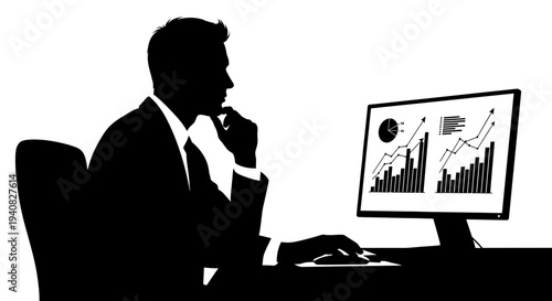 Businessman analyzing financial charts on computer screen, silhouette in office