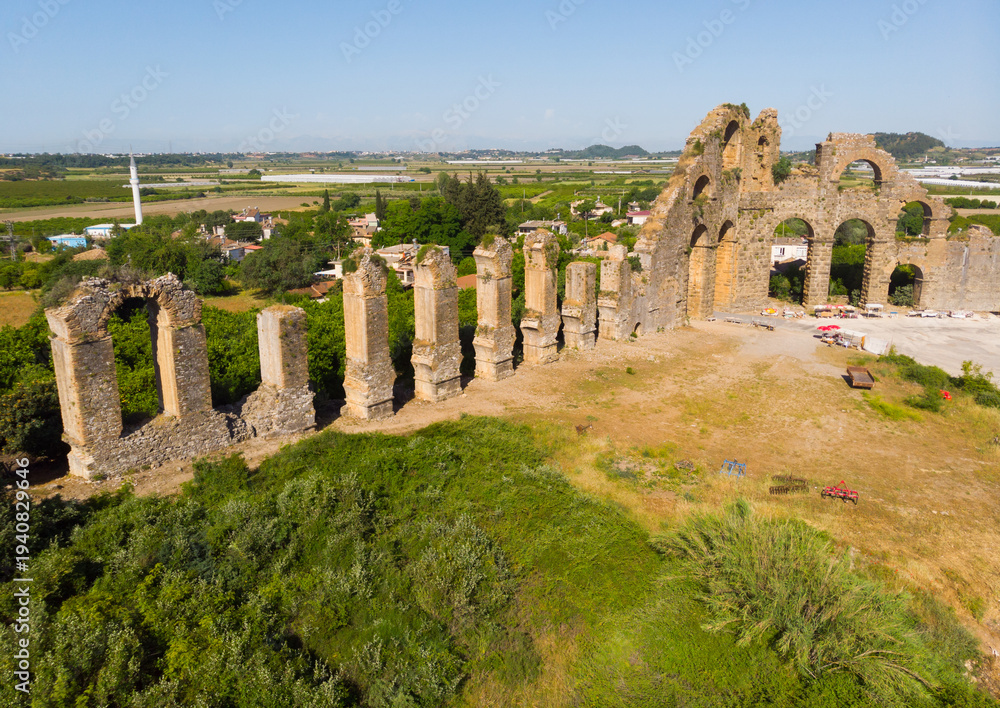 Naklejka premium Drone photo of aquduct in ancient city Aspendos. Antalya Province, Turkey.