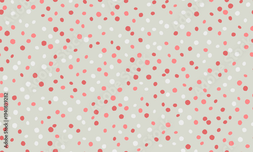 Charming pastel pink and white polka dots scattered on a neutral gray background.