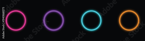 A striking arrangement of four neon glowing rings displaying pink purple teal and orange hues