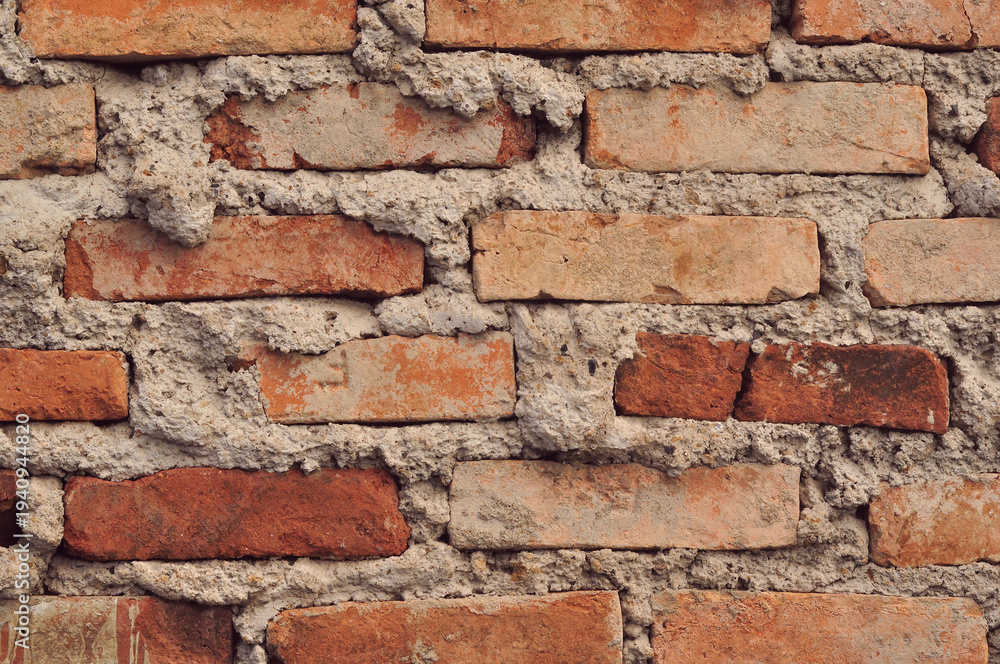 Obraz premium Raw Brick Wall Texture with Artistic Industrial Cement Finish