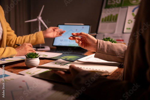 Business team analyzing esg data for sustainable energy planning