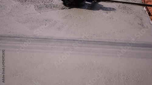 Pouring ready-mixed concrete onto reinforcing bars, We are pouring concrete on reinforced steel for the foundation