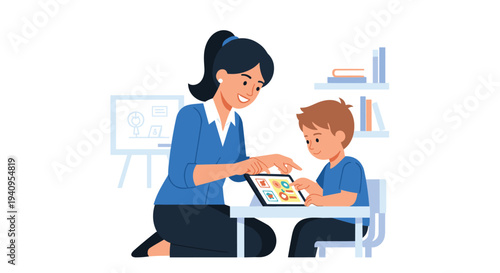 A woman in a blue shirt sits at a white table with a young boy while they both interact with a digital tablet displaying colorful icons.