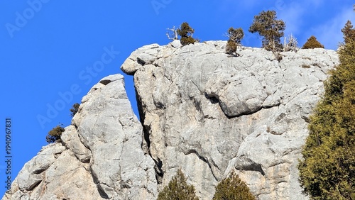 The separate pieces formed in the large rock and its mysterious appearance.