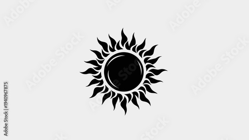 Black and white sun icon on white background symbolizing energy and light
