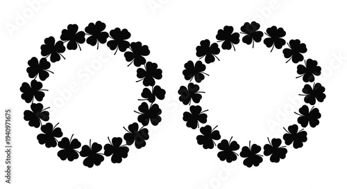 Two circular wreaths composed of detailed black four leaf clovers