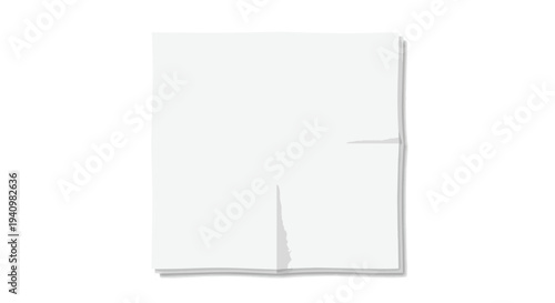 A plain, unadorned sheet of paper, crisply folded and casting a subtle shadow on a white background, ready for creative expression or information.
