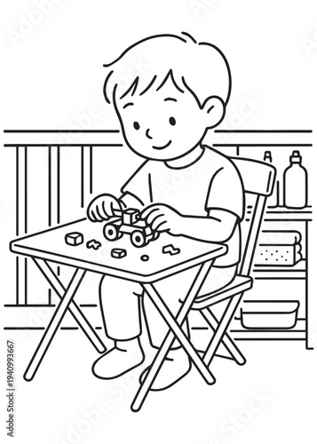 coloring book page boy building toy models and arranging pieces at a small table