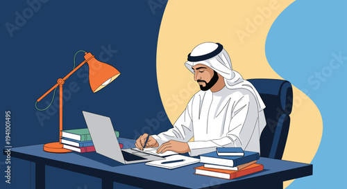Arab man in traditional white attire sitting at a desk while writing in a notebook and using a laptop in an office.
