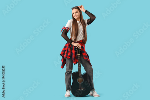 Cool young girl with guitar...