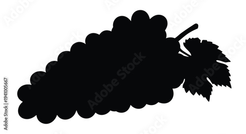 A silhouetted bunch of grapes with leaves and a stem