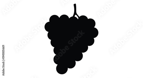 A silhouette of a bunch of dark grapes hanging from a stem