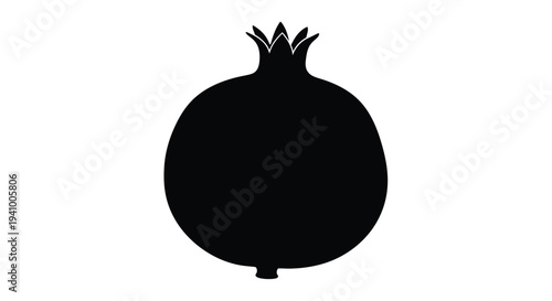 A striking black silhouette of a ripe pomegranate fruit is displayed