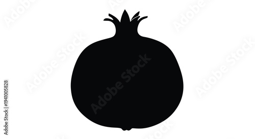 A striking black silhouette of a ripe pomegranate fruit