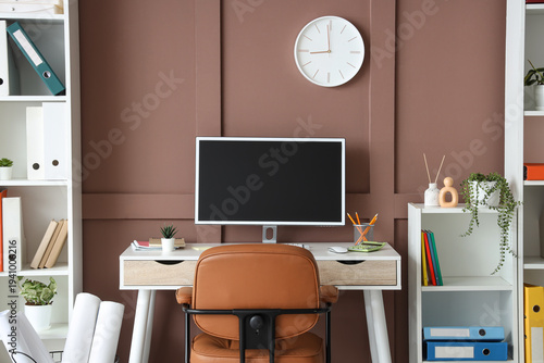 Workplace with blank comput...