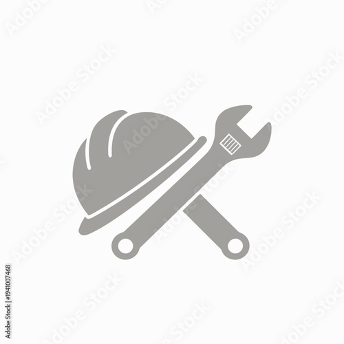 Construction Hard Hat and Wrench Icon – Engineering and Maintenance Concept