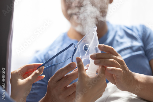 Quadro su tela Close up of patient receiving nebulizer mask for respiratory therapy