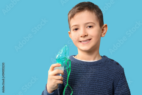Little boy with nebulizer o...