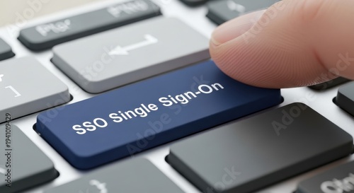 Finger Pressing SSO Single Sign-On Button on Keyboard for Secure Digital Authentication Concept