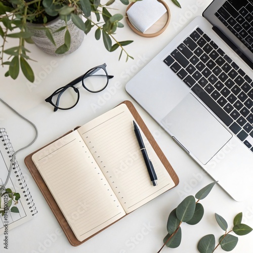 Modern Workspace Flat Lay with Notebook and Plant