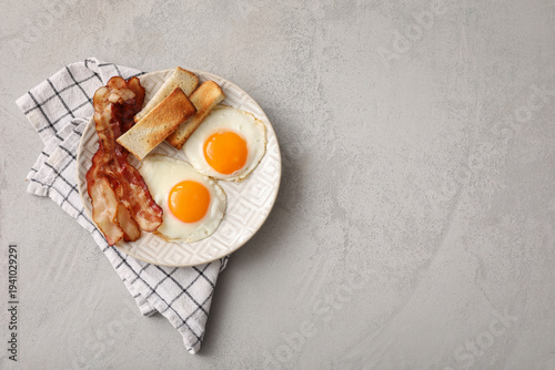 Plate with tasty fried eggs...