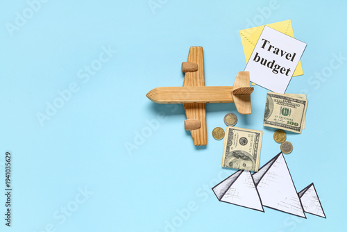 Paper with text TRAVEL BUDG...