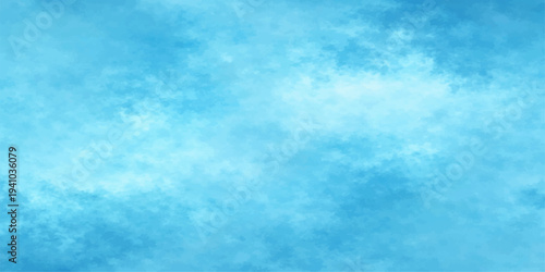 A beautiful clear blue sky background with bright white clouds and sunlight creates a serene summer nature cloudscape in the open air