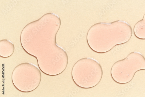 Drops of pink cosmetic oil ...