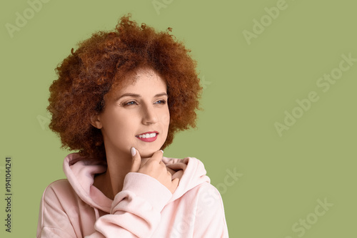 Thoughtful redhead young wo...