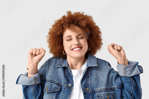 Happy redhead young woman w...