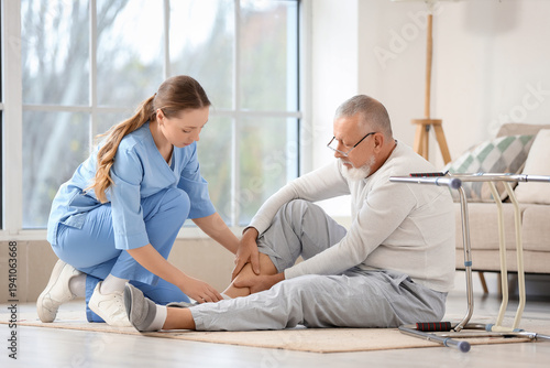 Nurse and injured senior ma...