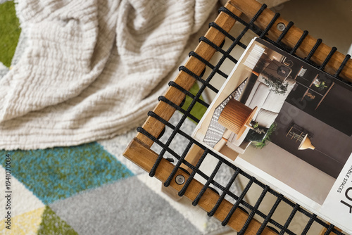 Magazine on coffee table in...