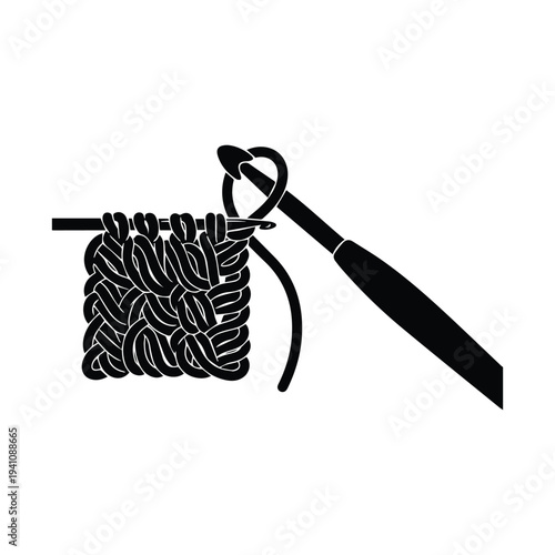 Crochet hook creating handmade fabric with yarn