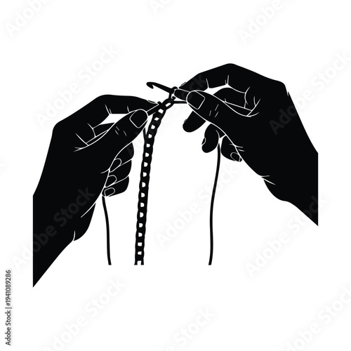 Hands cutting zip tie with scissors in black silhouette