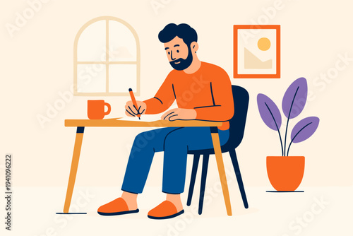 man writing on a desk at home