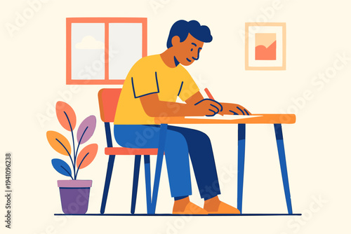 man writing on a desk at home