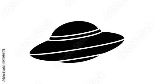 Black silhouette of a flying saucer.