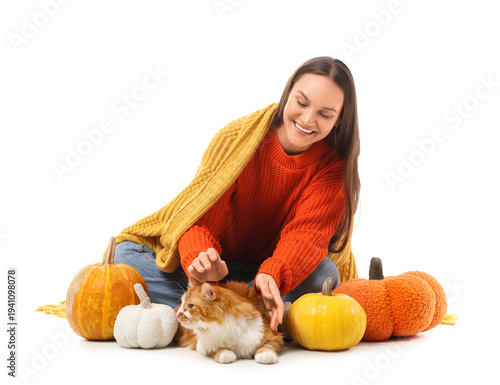 Young woman with cute cat a...