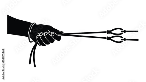 A hand holding a pair of pruning shears